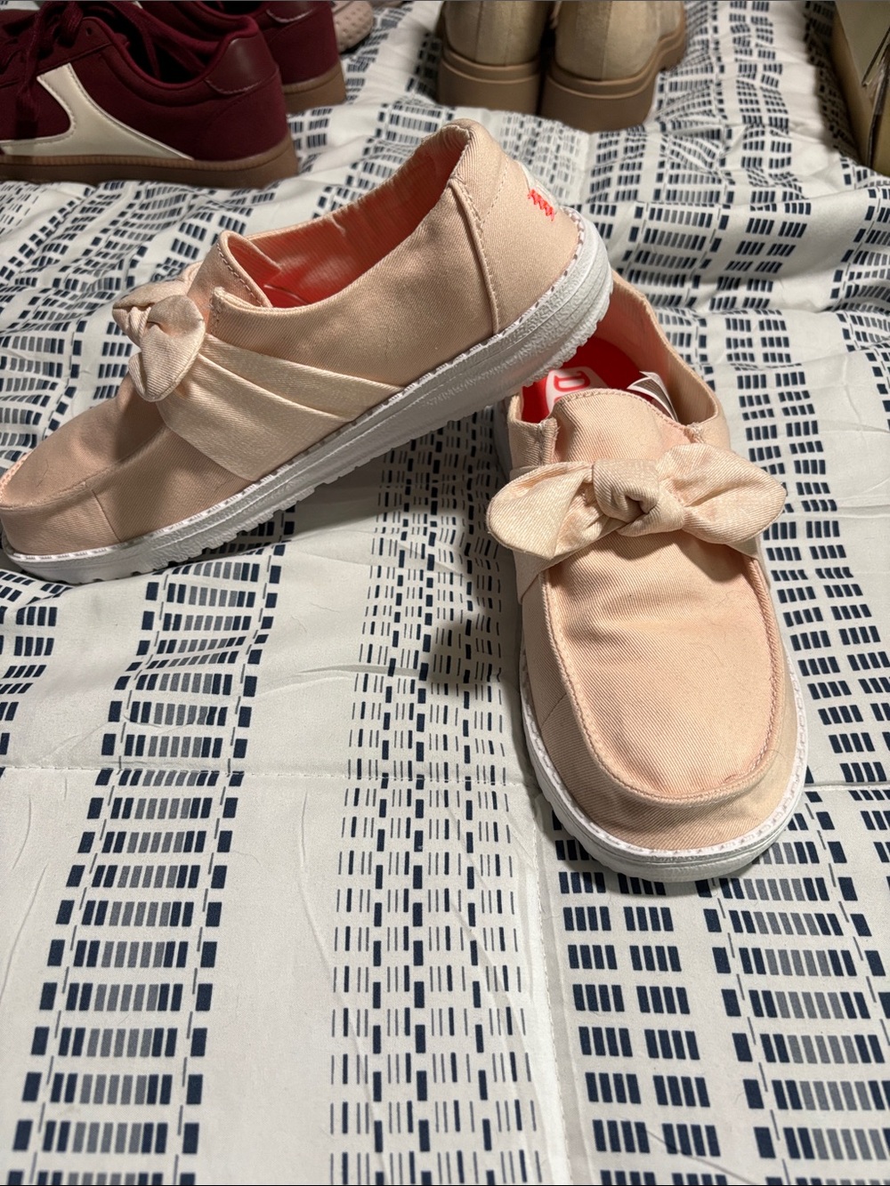 Hey Dude Women’s Bow-Accent Slip-On Sneakers — Pale Pink